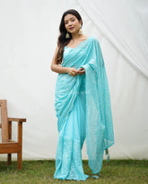 Safron Sky Blue Sequence Worked Heavy Georgette Saree